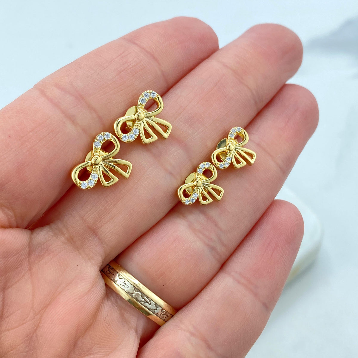 18k Gold Filled 12mm or 10mm Petite Ribbon Bow Stud Earrings featuring Micro Pave, Cutout Bow with Cubic Zirconia Stud, Wholesale Jewelry
